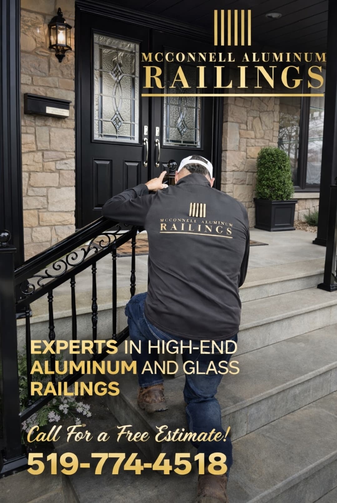McConnell Aluminum Railings technician installs black aluminum railings on stone steps of a house.